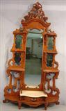 304 - Walnut Victorian etagere with marble base, grapes carved in crown, 92in. T, 52in. W, 18in. D, pierced carved shelf brackets, ca. 1870.