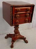 305 - Mahogany Empire 3 drawer work table with drop leaf, acanthus carved base, claw feet and wood carved pulls, 31in. T, 16in. W, 16in. D.