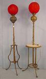 310 - Brass Victorian piano lamp with red satin gone with the wind shade, ca. 1880, 73in. T.
311 - Brass Victorian piano lamp with marble in base, red satin puff shade, 72in. T.