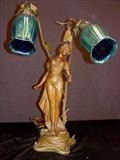 217 - Art Nouveau newel lamp with iridescent blue glass shades, 25in. T, 15in. W, ca. 1915.