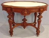 242 - Walnut Victorian marble top center table with insert white marble, 29in. T, 41in. W, 27in. D., ca. 1860.