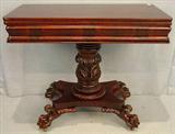 257 - Federal style mahogany game table with acanthus carved base, claw feet, 30in. T, 36in. L, 18in. D., ca. 1840