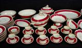 646 - 78 pieces of Old Paris porcelain china dinner set, deep rose colored with gold grim, large serving pieces, ca. 1850.