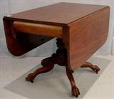 502 - Mahogany Federal breakfast table with acanthus carved pedestal, claw feet and drop leaf, 54in. L, 38in. W, 29in. T, ca. 1840