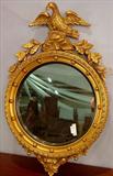 504 - Gold leaf federal mirror with eagle on top, 36in. T, 23in. W, ca. 1880.