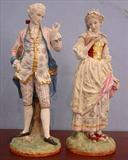 506 - Pair of porcelain figurines, 20in. T, 7in. W, ca. 1890.
