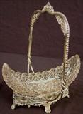 446 - Silver- plate Victorian card receiver with canoe shaped bowl, 10in. T, 8in. L