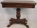 465 - Mahogany game table, gadrooned with acanthus carved base, claw feet, 30in. T, 35in. W, 17in. D.