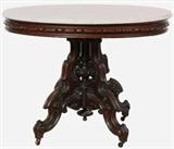 145 - Walnut victorian marble top oval parlor table, carved around apron, ca. 1875
