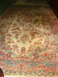 169 - Persian Kerman hand made wool rug, 9ft 2in. X 17ft., beige with red flowers, blue background