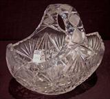 215 - Cut glass basket, 10in. T, 11in. W, very heavy.