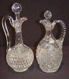 217 - Cut glass ewer with original stopper, 13in. T. 218 - Cut glass ewer with original stopper with ribbed handle, 11in. T.