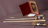234 - One quarter plate tin type of Civil War Soldier, 9in. T, 7in. W.
233 - Carl Eickhorn sword with scabbard.
232 - Grand Army of the Republic with scabbard