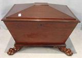 240 - Mahogany empire cellarets in original finish with claw feet, 18in. T, 30in. W, 25in. D.