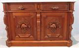 252 - Walnut Victorian server with wood carved bird dog heads on each door, white marble top, 39in. T, 59in. L, 23in. D., ca. 1875.