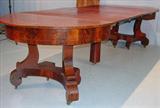 269 - Empire mahogany extension table with unusually small width, 47in. W, has five 20in. Leaves, pulls out to 12ft 4in. L.