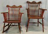 304 - Pair of dolphin head chairs, rocker and side chair, spindle back, ca. 1880, signed Stickle Brandi.