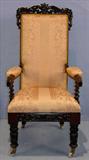 310 - Rosewood straight back hall chair with gold silk upholstery 48in. tall, 21in. wide, 18in. deep, ca. 1870 with acanthus carved legs.