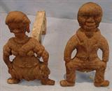 309 - Pair of old cast iron andirons of early black figures 16in tall, 10 in wide, ca. 1850.
