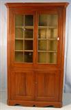 315 - Large primitive popular 2 piece corner cabinet with original glass doors, 89in. tall , 52in. wide ,25in. deep, ca. 1840.