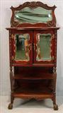 314 - Mahogany etagere with bevel mirrors, claw feet, twisted column front, 57in. tall , 27in. wide 17in. deep, ca.1890.