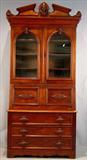 338 - Walnut Victorian slant front secretary with heads carved over door and wood carved pulls, ca.1870, 97in. tall , 44in. wide , 19in. deep.