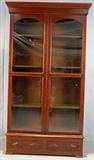355 - Walnut victorian two door book case with adjustable shelves, ca. 1875, 85in. tall, 44in. wide, 17in. deep.
