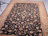 557 - Hand made persian rug blue 9 feet long 6 feet wide.