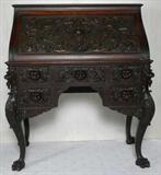 123 - Heavily Carved Slant Front Desk with Birds and Winged Griffith Supports att. to Horner.