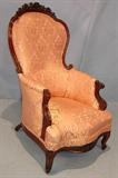 176 - Rosewood armed Victorian recliner parlor chair.