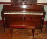 1400 - Mahogany spinet piano made by Wurlitzer from 1940, plays perfect in like new condition.