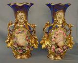 56 - Pair of old Paris vases, ca. 1880. 15in. T, 10in. W, heavy gold decoration, dark blue with roses.