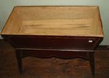 217 - Primitive dough box hand cut dove tail, grain finish with gold incising on legs, 28in. T, 34in . W, 15in. D.