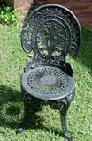235 - Black cast iron chair.