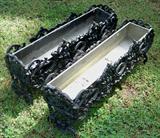 236a - Pair of black cast iron flower pots.