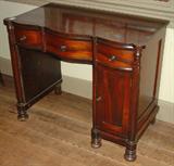 301 - Rosewood knee whole desk with 3 serpentine  doors.