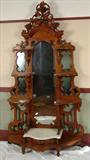 3- Walnut Victorian Etagere with marble base, grapes carved and pierce carved shelves, 92in. T, 52in. W, 18in. D.