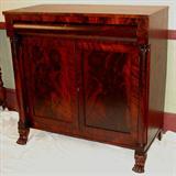 109 - Empire linen press with columns and paw feet, mahogany, 46in. T, 46in. W, 53 in. D.