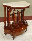 111 - Walnut rosewood canterbury with drawer and white marble, 36in. T, 31in. W, 17in. D.