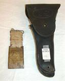 131 - G.A.R. belt buckle with remnants of leather dated 1866. 
132 - U.S. Army issued side arm holster, ca. 1900.