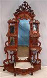 267 - Walnut Victorian etagere with white marble base, pierce carved supports, grapes carved in crown, 87in. T, 51in. W, 19in. D, ca. 1860.