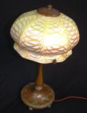 159 - Art Nouveau Electric Lamp with Bronze Base, Quezal Yellow, White, and Gold Glass Shade, and Bronze Heat Vent, 14in. tall