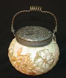 226 - Crown Maleno Covered Jar with Floral Design, Silver Plate Mounts, and Applied Butterfly Marked C.M. 8.5 in. T. X 7 in. Dia.