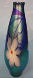 272 - Signed Vandermark 1979 Iridescent Art Glass Vase with Blue and White Floral Design 11 in. T. X 3.75 in. Dia.