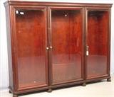 142 - Mahogany 3 door Bookcase, ca. 1900 with Claw Feet, 72in. W  5ft. 5in. T X 12in. Diameter