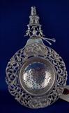 074 - Windmill Tea Strainer, Coin Silver, Holland Gueen and D, 5.50in., 1.8 oz., ca. 1913 (according to stamp)