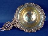 92 - Tea Strainer, Coin Silver Cherub Rose and Flower Garland, 800 Wheel and Moon and Crown, 4.75in., ca. 1886 - 1900