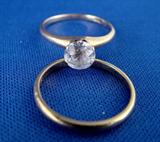 310 - White Sapphire wedding ring set in yellow gold