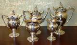163 - Very Fine Gorham Helmet-Shaped Sterling Silver Heavy Tea Service with Four Seasons Masks and Lion, Shield Finials including Coffee, Tea, Cream & Sugar, and Waste