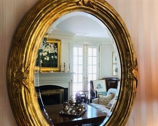 Stunning oval antique gilt mirror